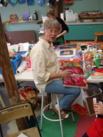 Dena Working on her Books